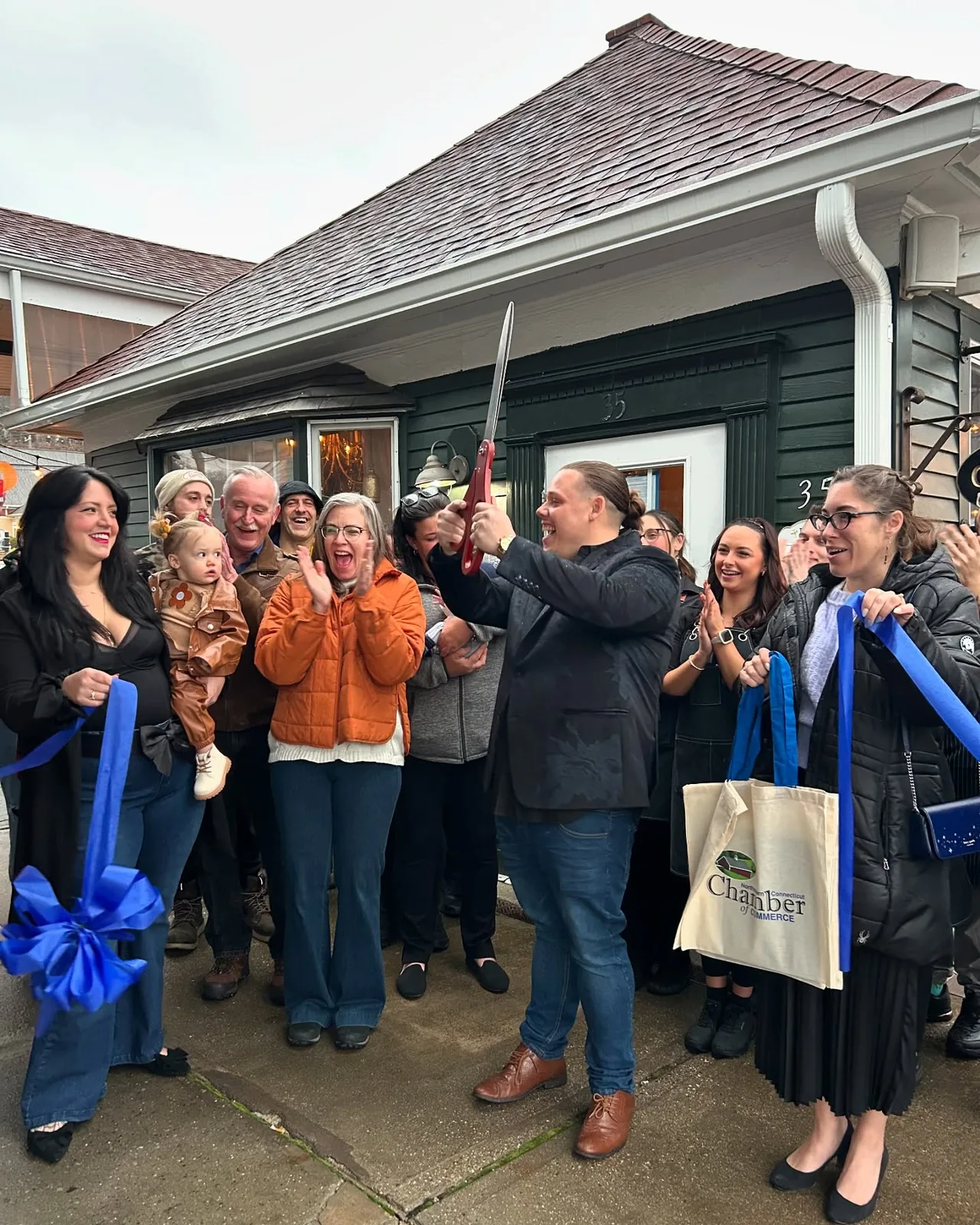 Blackstone Putnam grand opening ribbon cutting on Main Street